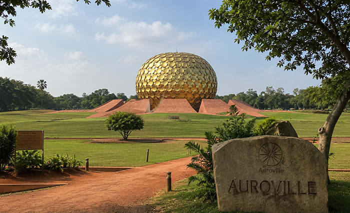 Modern golden spherical architecture against blue sky