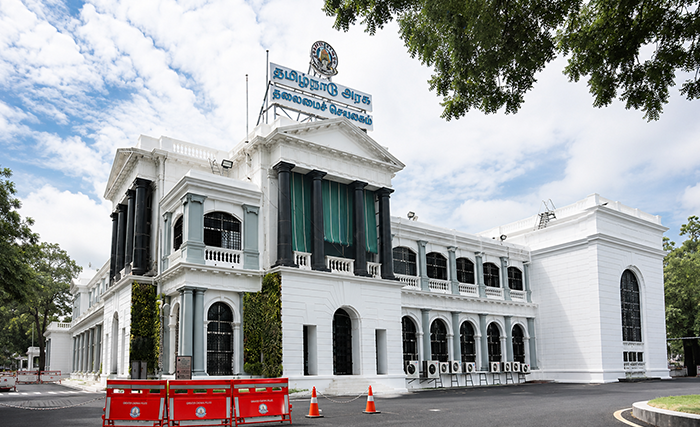 Colonial-era white building with columns